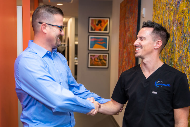 dr chambers and dental implant patient smiling